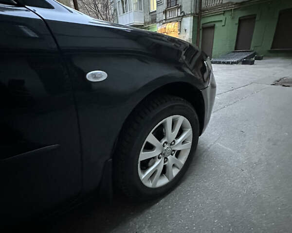 Чорний Мазда 3, об'ємом двигуна 1.6 л та пробігом 177 тис. км за 6100 $, фото 6 на Automoto.ua