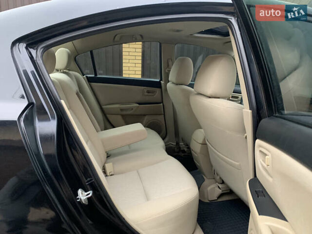 Черный Мазда 3, объемом двигателя 1.6 л и пробегом 200 тыс. км за 4999 $, фото 22 на Automoto.ua