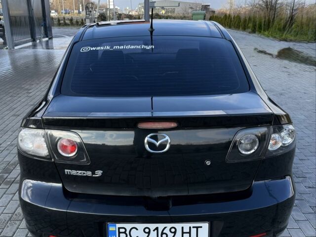 Черный Мазда 3, объемом двигателя 2 л и пробегом 154 тыс. км за 5500 $, фото 3 на Automoto.ua