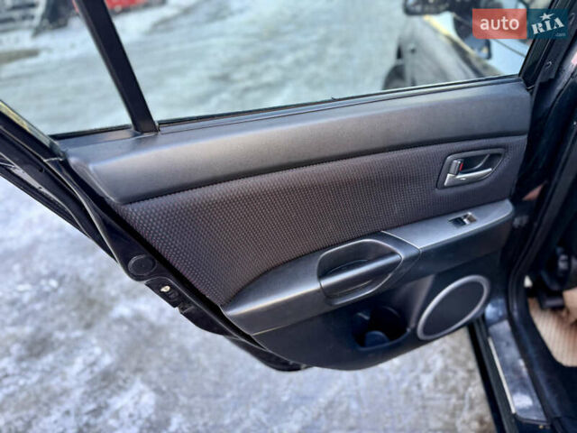 Черный Мазда 3, объемом двигателя 1.6 л и пробегом 210 тыс. км за 3950 $, фото 8 на Automoto.ua