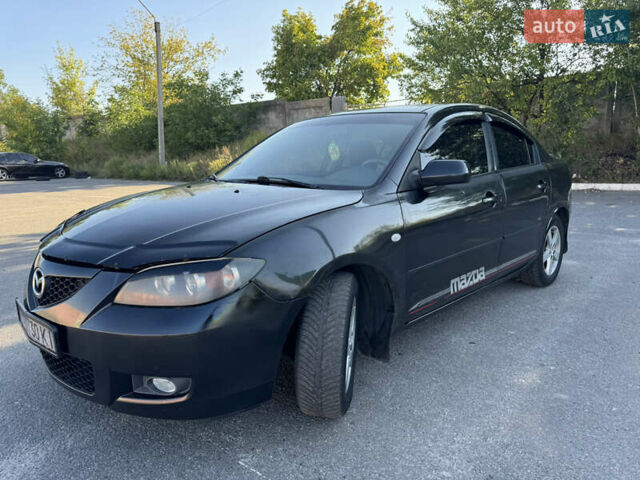 Черный Мазда 3, объемом двигателя 2 л и пробегом 150 тыс. км за 5999 $, фото 28 на Automoto.ua