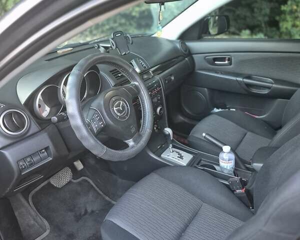 Чорний Мазда 3, об'ємом двигуна 1.6 л та пробігом 168 тис. км за 5600 $, фото 12 на Automoto.ua