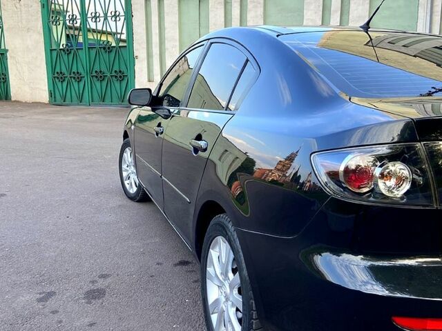 Чорний Мазда 3, об'ємом двигуна 2 л та пробігом 220 тис. км за 5400 $, фото 6 на Automoto.ua