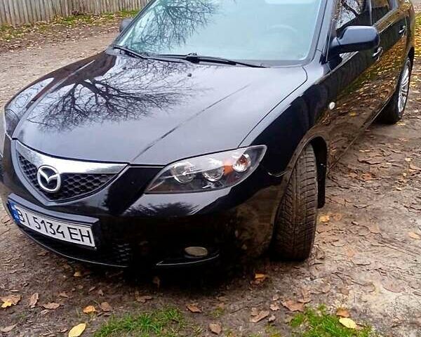 Черный Мазда 3, объемом двигателя 2 л и пробегом 240 тыс. км за 5600 $, фото 10 на Automoto.ua