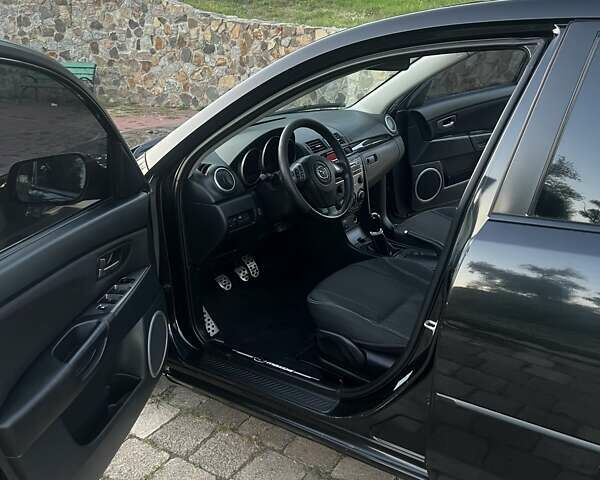 Черный Мазда 3, объемом двигателя 2 л и пробегом 330 тыс. км за 5000 $, фото 5 на Automoto.ua