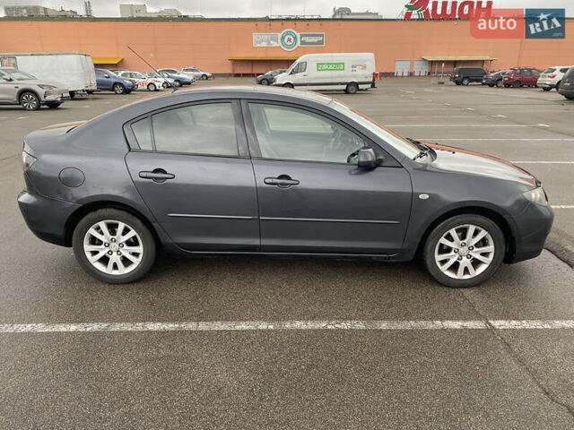 Чорний Мазда 3, об'ємом двигуна 1.6 л та пробігом 188 тис. км за 6800 $, фото 3 на Automoto.ua