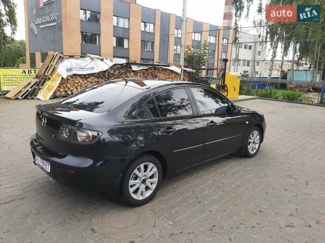 Черный Мазда 3, объемом двигателя 1.6 л и пробегом 183 тыс. км за 5800 $, фото 3 на Automoto.ua