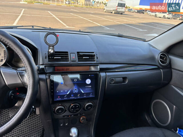 Чорний Мазда 3, об'ємом двигуна 1.6 л та пробігом 230 тис. км за 6600 $, фото 9 на Automoto.ua