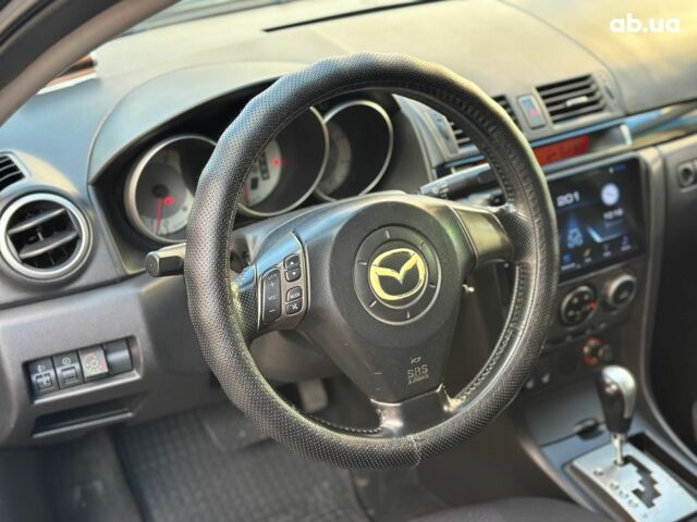 Чорний Мазда 3, об'ємом двигуна 1.6 л та пробігом 232 тис. км за 6740 $, фото 22 на Automoto.ua