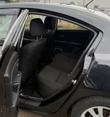 Черный Мазда 3, объемом двигателя 1.6 л и пробегом 175 тыс. км за 4700 $, фото 3 на Automoto.ua