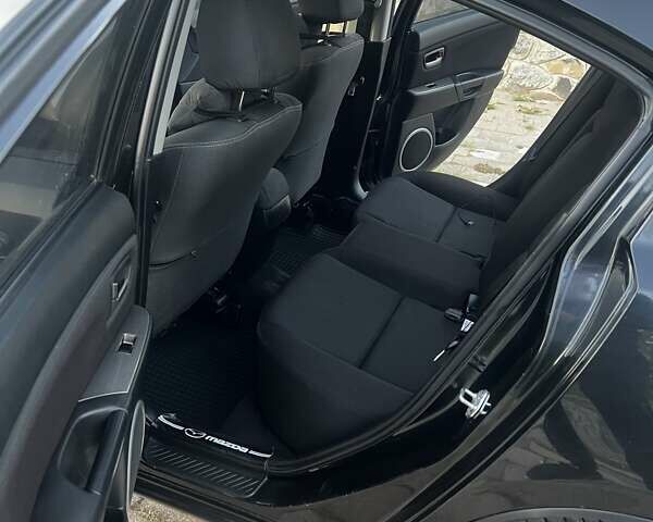 Черный Мазда 3, объемом двигателя 2 л и пробегом 330 тыс. км за 5000 $, фото 6 на Automoto.ua