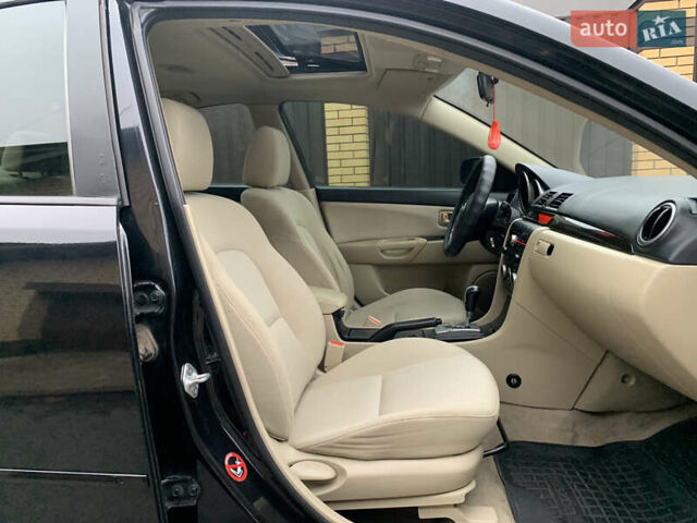 Черный Мазда 3, объемом двигателя 1.6 л и пробегом 200 тыс. км за 4999 $, фото 24 на Automoto.ua