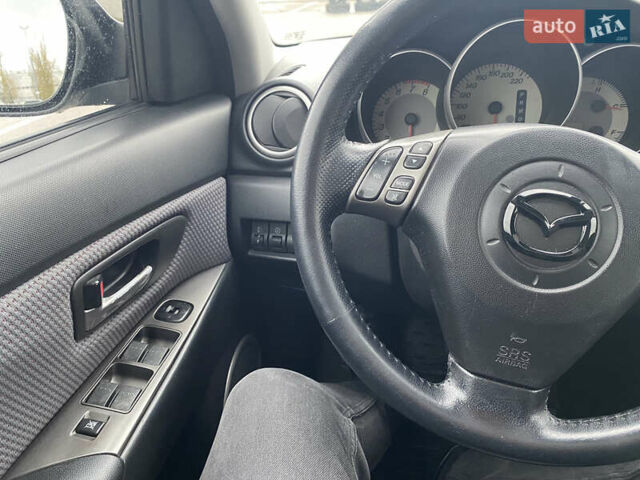 Чорний Мазда 3, об'ємом двигуна 1.6 л та пробігом 188 тис. км за 6800 $, фото 19 на Automoto.ua