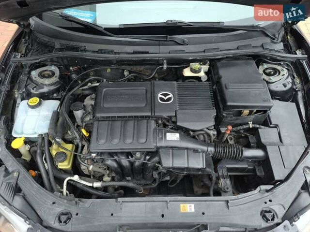 Черный Мазда 3, объемом двигателя 1.6 л и пробегом 132 тыс. км за 4999 $, фото 23 на Automoto.ua