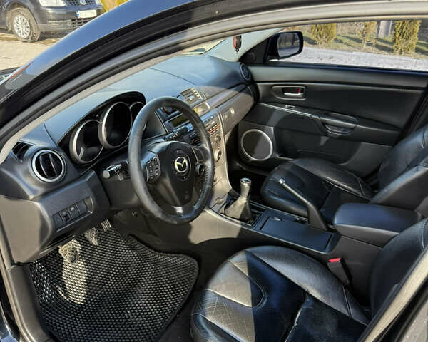 Черный Мазда 3, объемом двигателя 2 л и пробегом 154 тыс. км за 5500 $, фото 6 на Automoto.ua