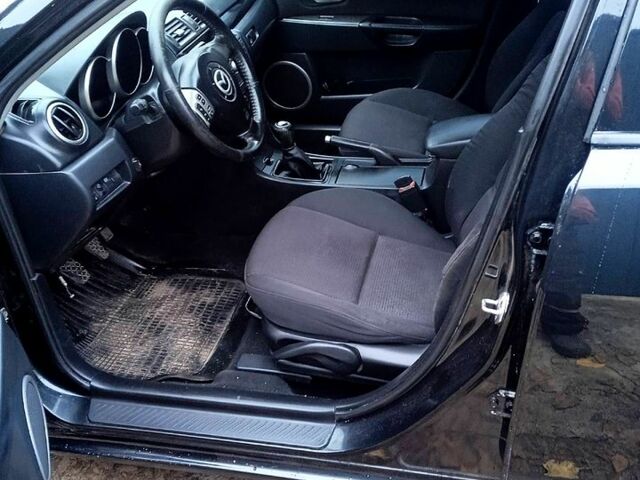 Черный Мазда 3, объемом двигателя 2 л и пробегом 240 тыс. км за 5600 $, фото 7 на Automoto.ua