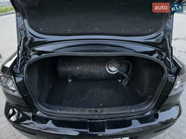 Чорний Мазда 3, об'ємом двигуна 1.6 л та пробігом 350 тис. км за 6800 $, фото 9 на Automoto.ua