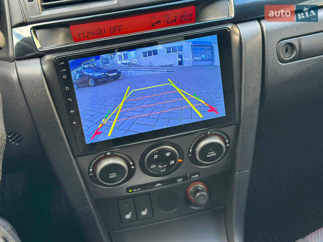 Черный Мазда 3, объемом двигателя 1.6 л и пробегом 232 тыс. км за 6740 $, фото 24 на Automoto.ua