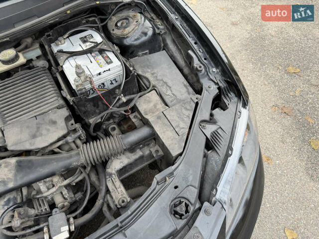 Черный Мазда 3, объемом двигателя 1.6 л и пробегом 189 тыс. км за 4300 $, фото 15 на Automoto.ua