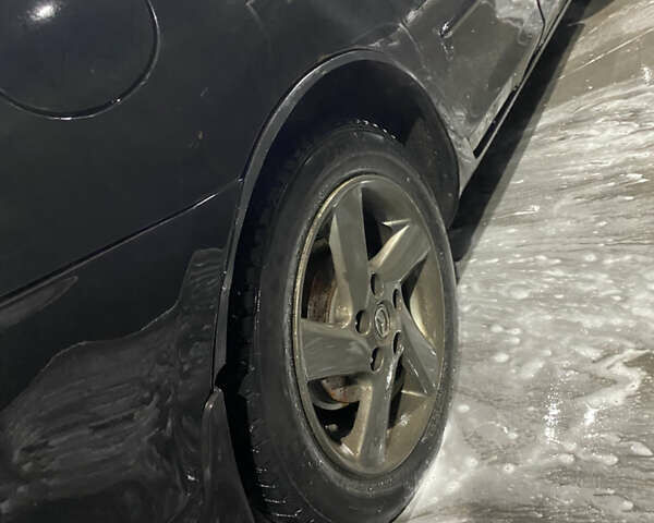 Чорний Мазда 3, об'ємом двигуна 1.6 л та пробігом 257 тис. км за 5100 $, фото 7 на Automoto.ua