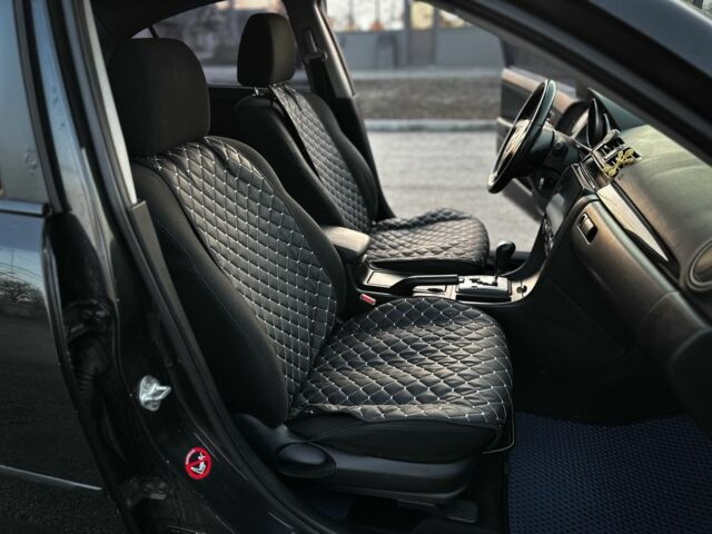 Черный Мазда 3, объемом двигателя 1.6 л и пробегом 290 тыс. км за 4400 $, фото 12 на Automoto.ua