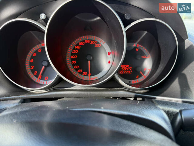 Черный Мазда 3, объемом двигателя 2 л и пробегом 154 тыс. км за 5500 $, фото 10 на Automoto.ua