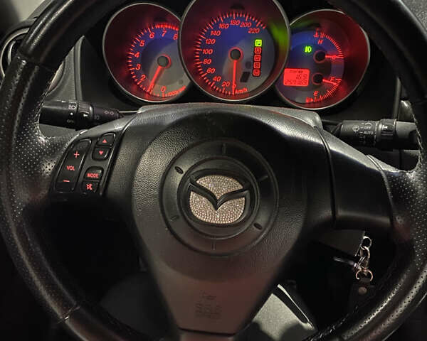 Чорний Мазда 3, об'ємом двигуна 1.6 л та пробігом 257 тис. км за 5100 $, фото 16 на Automoto.ua