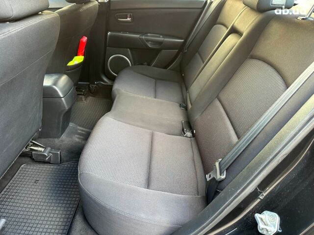 Чорний Мазда 3, об'ємом двигуна 1.6 л та пробігом 232 тис. км за 6740 $, фото 13 на Automoto.ua