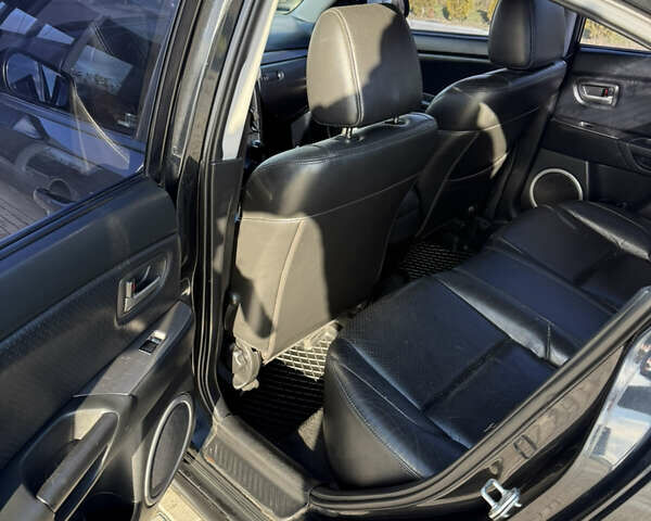 Черный Мазда 3, объемом двигателя 2 л и пробегом 154 тыс. км за 5500 $, фото 9 на Automoto.ua