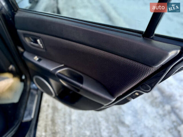 Черный Мазда 3, объемом двигателя 1.6 л и пробегом 210 тыс. км за 3950 $, фото 9 на Automoto.ua