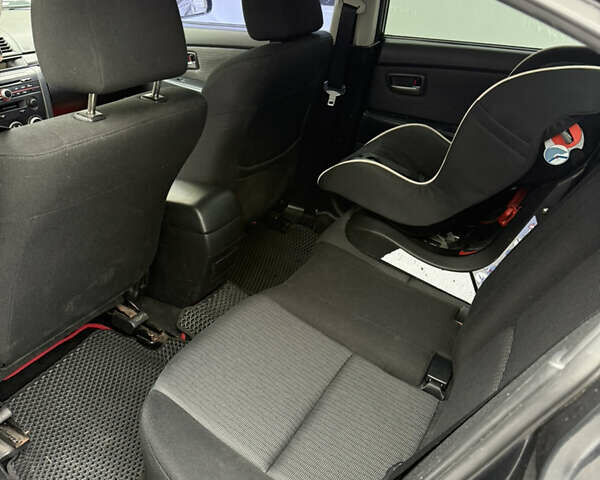 Чорний Мазда 3, об'ємом двигуна 1.6 л та пробігом 221 тис. км за 5500 $, фото 6 на Automoto.ua
