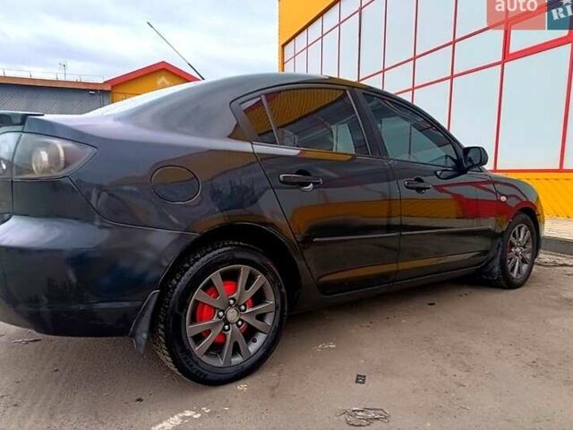Чорний Мазда 3, об'ємом двигуна 1.6 л та пробігом 233 тис. км за 6250 $, фото 1 на Automoto.ua