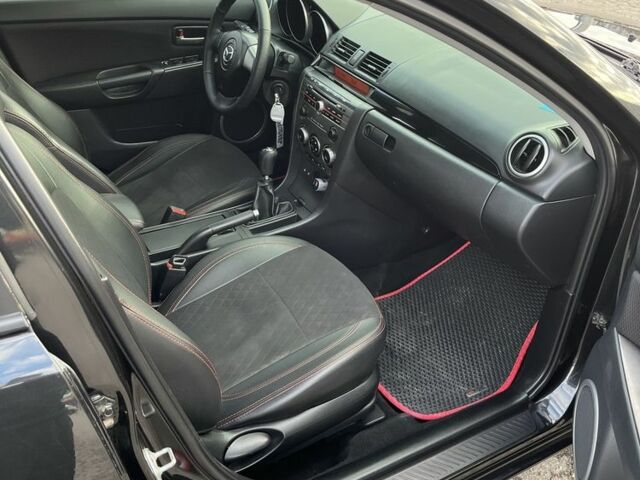 Черный Мазда 3, объемом двигателя 2 л и пробегом 166 тыс. км за 6000 $, фото 6 на Automoto.ua