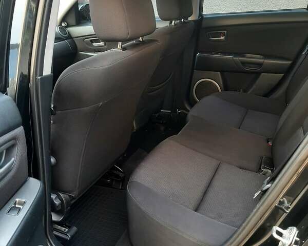 Черный Мазда 3, объемом двигателя 1.6 л и пробегом 183 тыс. км за 5800 $, фото 17 на Automoto.ua