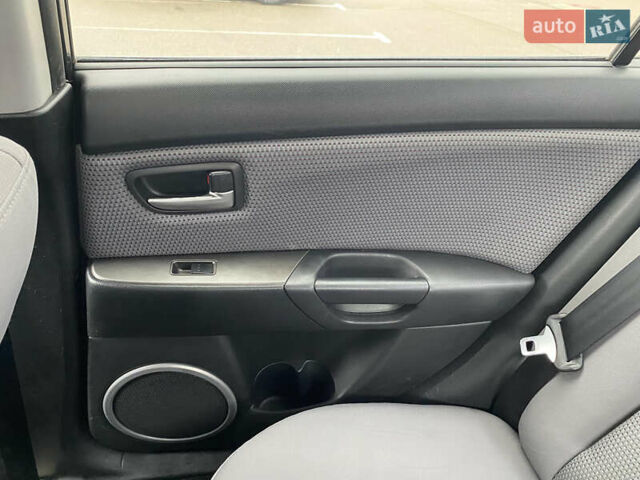 Чорний Мазда 3, об'ємом двигуна 1.6 л та пробігом 188 тис. км за 6800 $, фото 26 на Automoto.ua