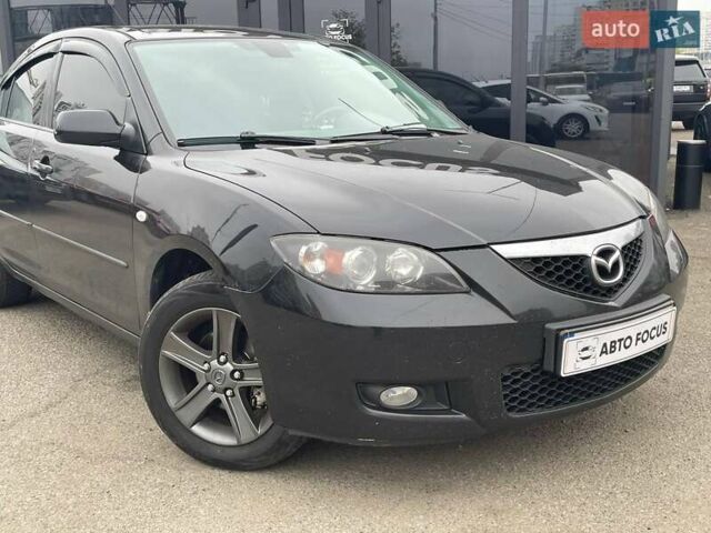 Чорний Мазда 3, об'ємом двигуна 1.6 л та пробігом 223 тис. км за 6490 $, фото 1 на Automoto.ua