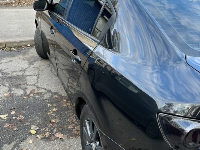 Черный Мазда 3, объемом двигателя 2 л и пробегом 166 тыс. км за 6000 $, фото 4 на Automoto.ua