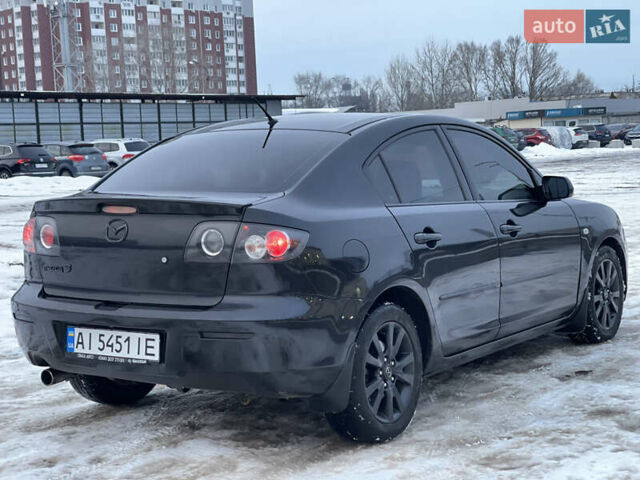 Чорний Мазда 3, об'ємом двигуна 2 л та пробігом 283 тис. км за 4600 $, фото 4 на Automoto.ua