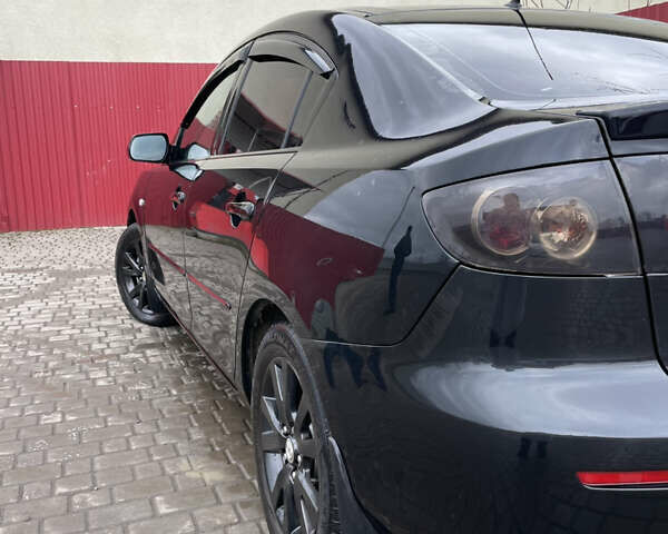 Черный Мазда 3, объемом двигателя 1.6 л и пробегом 189 тыс. км за 4500 $, фото 7 на Automoto.ua
