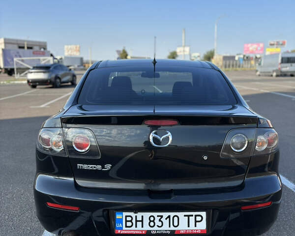 Чорний Мазда 3, об'ємом двигуна 1.6 л та пробігом 230 тис. км за 6600 $, фото 4 на Automoto.ua
