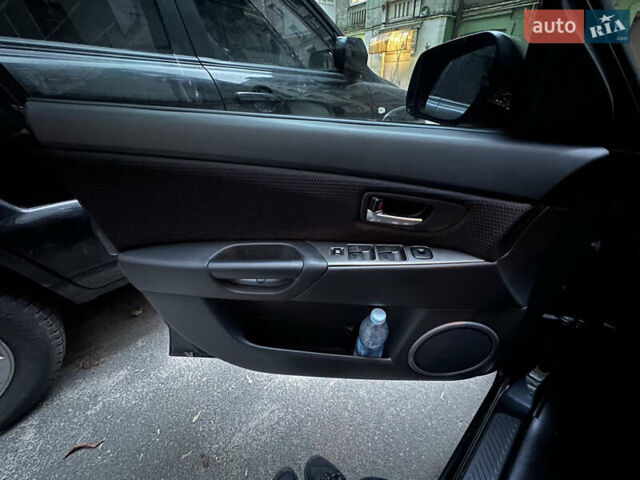 Чорний Мазда 3, об'ємом двигуна 1.6 л та пробігом 177 тис. км за 6100 $, фото 8 на Automoto.ua