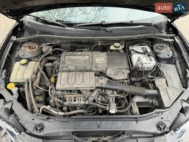 Черный Мазда 3, объемом двигателя 1.6 л и пробегом 189 тыс. км за 4300 $, фото 14 на Automoto.ua