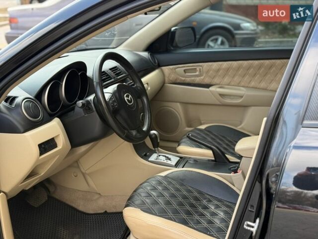 Чорний Мазда 3, об'ємом двигуна 1.6 л та пробігом 268 тис. км за 5750 $, фото 10 на Automoto.ua