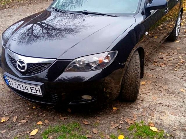 Черный Мазда 3, объемом двигателя 2 л и пробегом 240 тыс. км за 5600 $, фото 1 на Automoto.ua