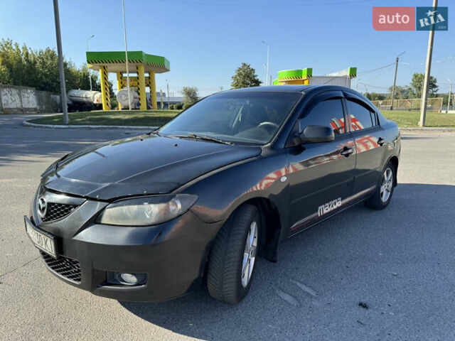 Черный Мазда 3, объемом двигателя 2 л и пробегом 150 тыс. км за 5999 $, фото 8 на Automoto.ua