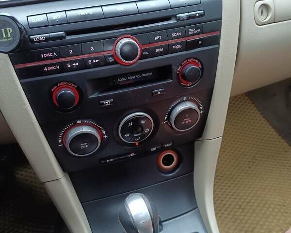 Черный Мазда 3, объемом двигателя 1.6 л и пробегом 232 тыс. км за 5850 $, фото 7 на Automoto.ua