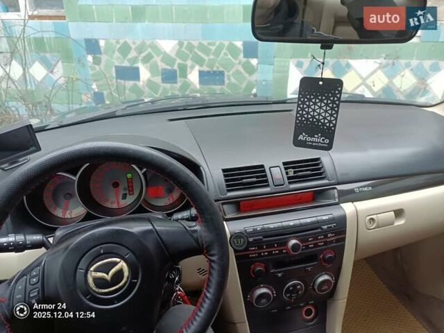 Черный Мазда 3, объемом двигателя 1.6 л и пробегом 232 тыс. км за 5850 $, фото 8 на Automoto.ua
