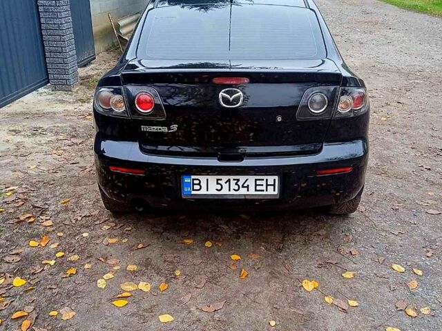 Черный Мазда 3, объемом двигателя 2 л и пробегом 240 тыс. км за 5600 $, фото 3 на Automoto.ua