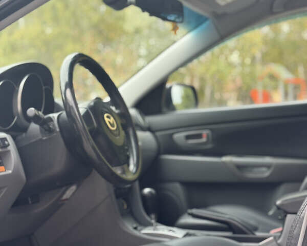 Черный Мазда 3, объемом двигателя 1.6 л и пробегом 201 тыс. км за 5900 $, фото 7 на Automoto.ua