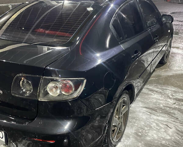 Чорний Мазда 3, об'ємом двигуна 1.6 л та пробігом 257 тис. км за 5100 $, фото 1 на Automoto.ua